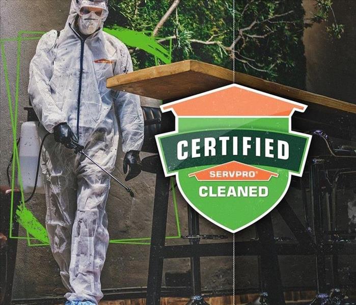 Certified: SERVPRO Cleaned logo and man in PPE