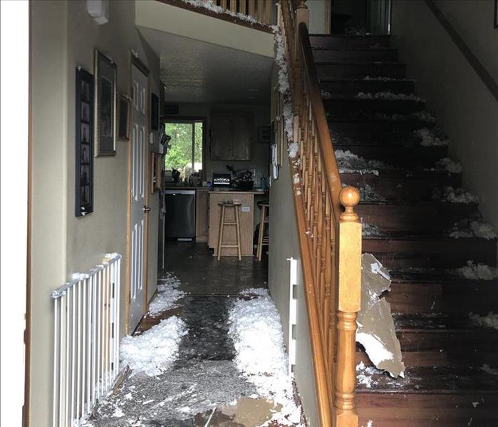 fire damaged entryway and stairwell
