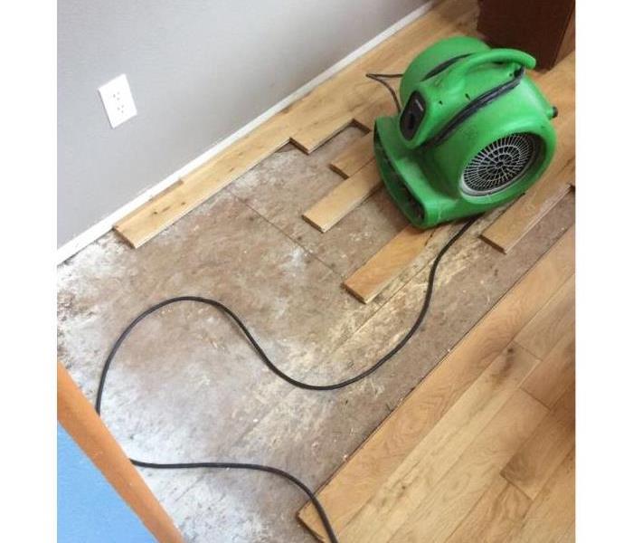 drying hardwood floors with servpro air mover