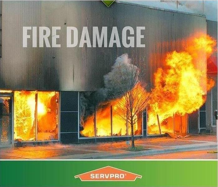 Commercial structure fire with servpro logo