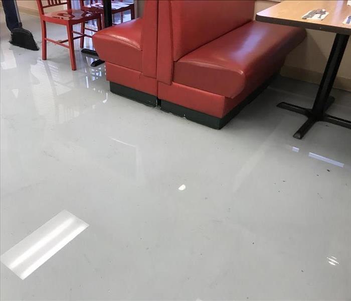 water damaged restaurant floors and booth